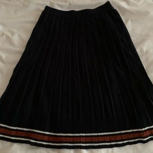 navy pleated skirt with orange and white trim🎃✨🍂